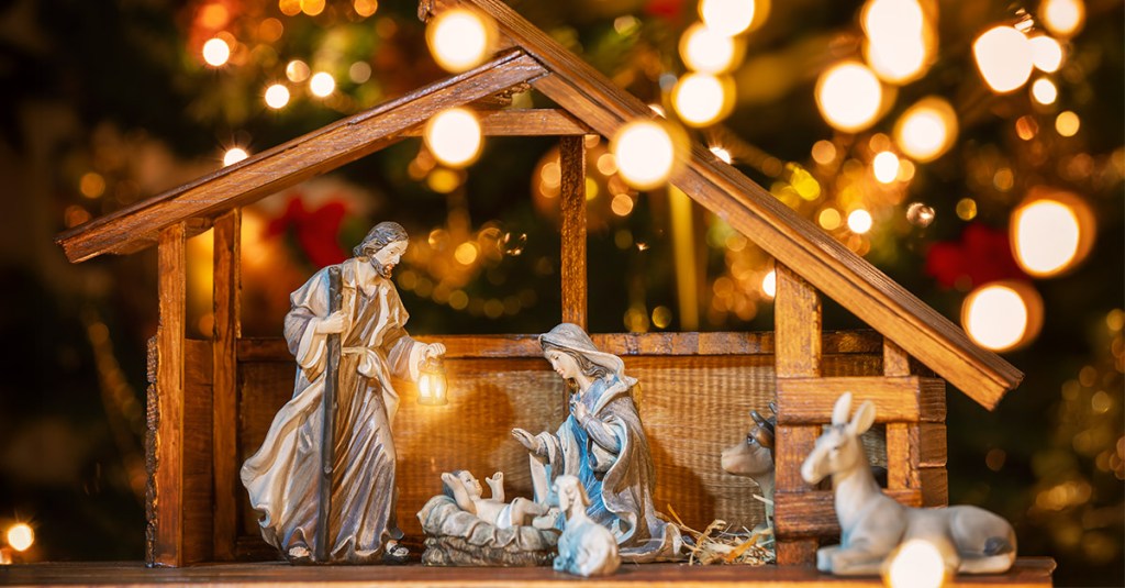 A manger scene reminds us that Christmas Bible verses are an important part of the season.