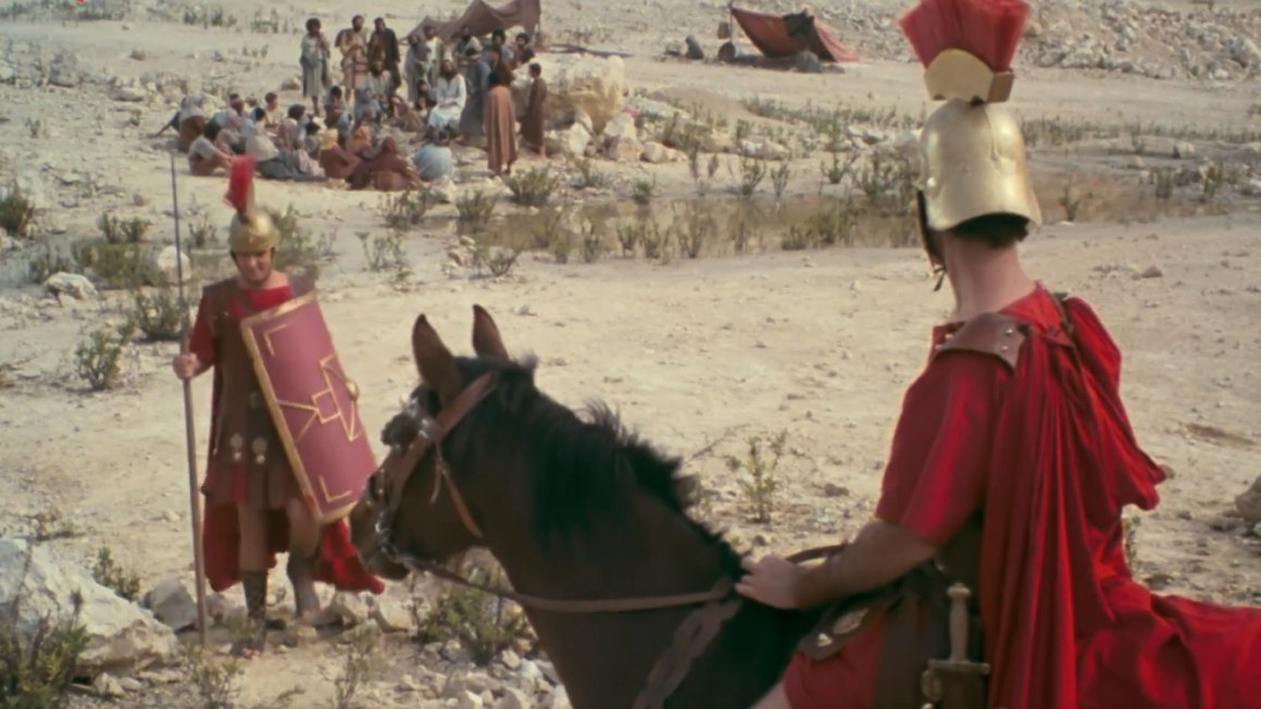 Centurion looking at Jesus and his disciples