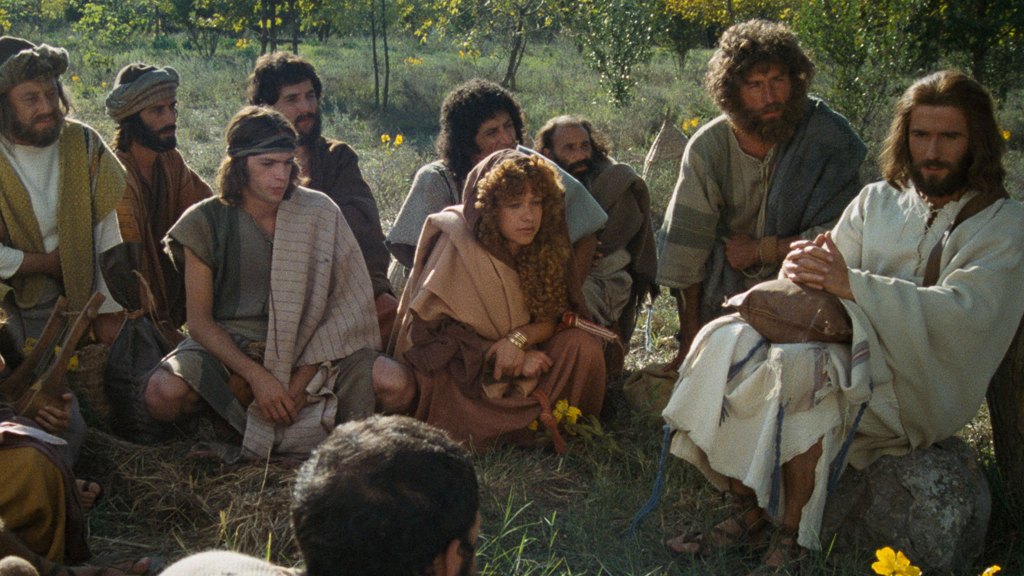 Jesus sitting and speaking with his disciples
