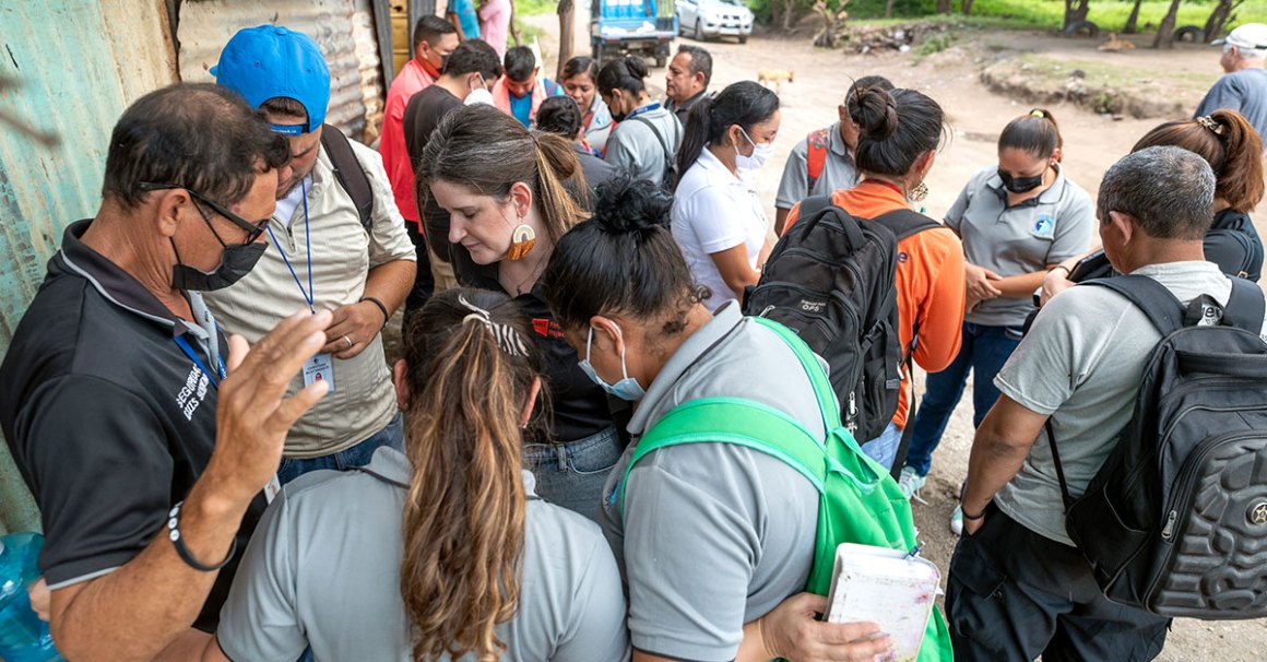 Group of people praying together