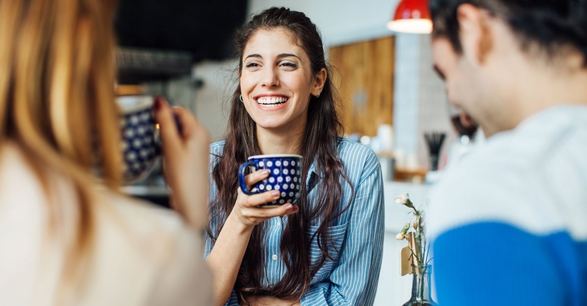 woman having coffee with friends