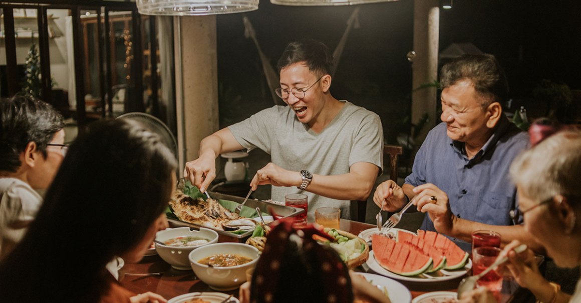 Asian family having dinner together