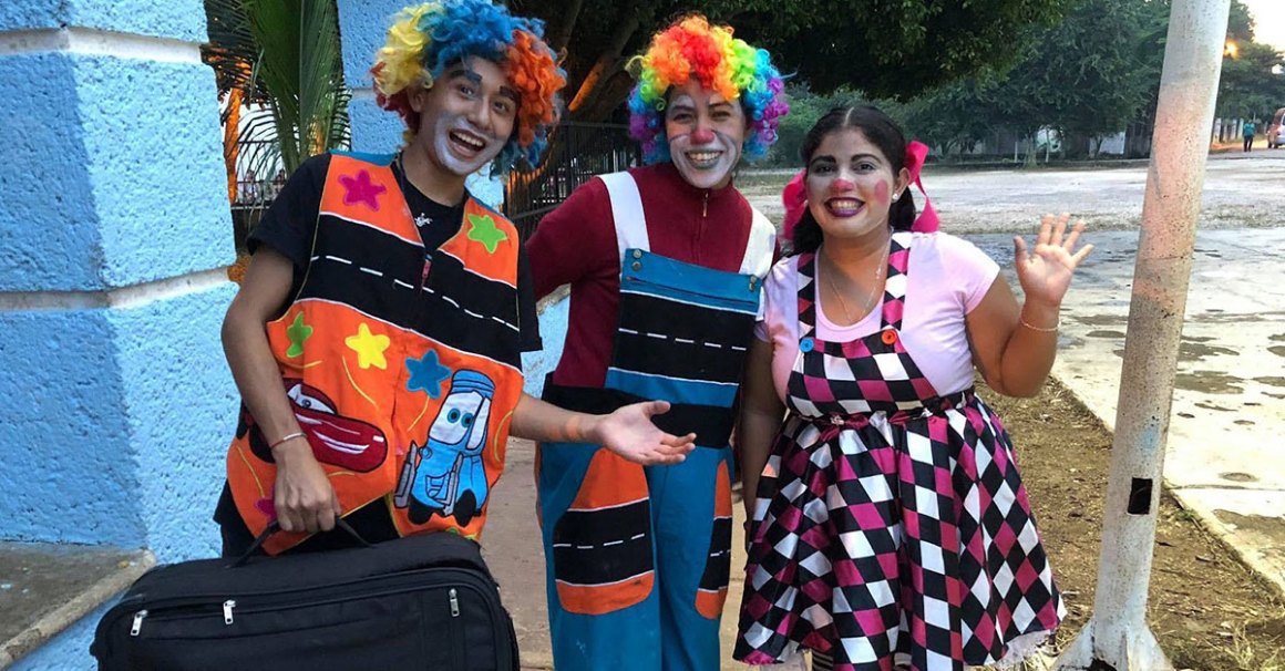 3 Clowns posing for a photo