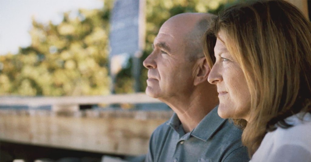 two people looking out