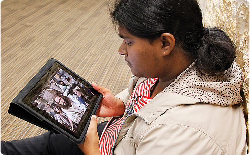 A man viewing evangelistic material on an ipad. The evangelism definition is important to grasp as believers