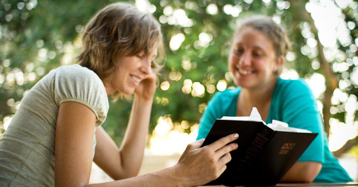 Two girls engaging in personal evangelism strategy.