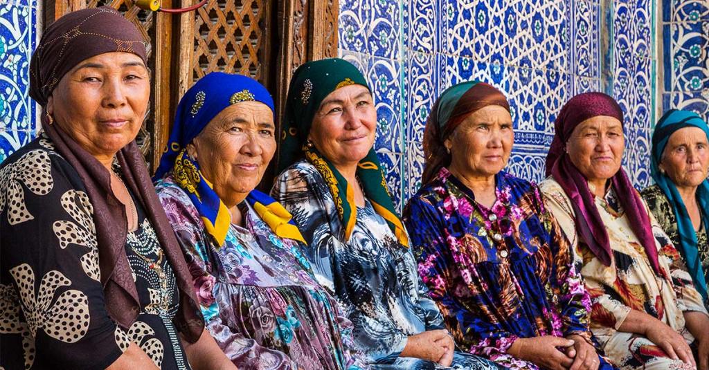 A group of Central America woman watch the film of Mary Magdalene together with interest.