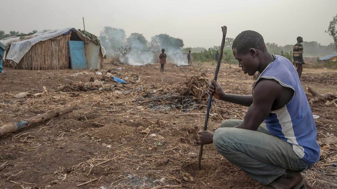 Rural african man working on land